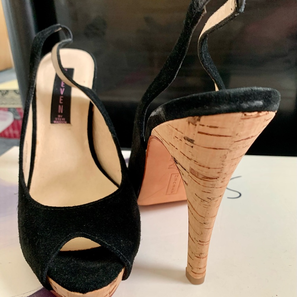 Black sling back genuine leather heels.